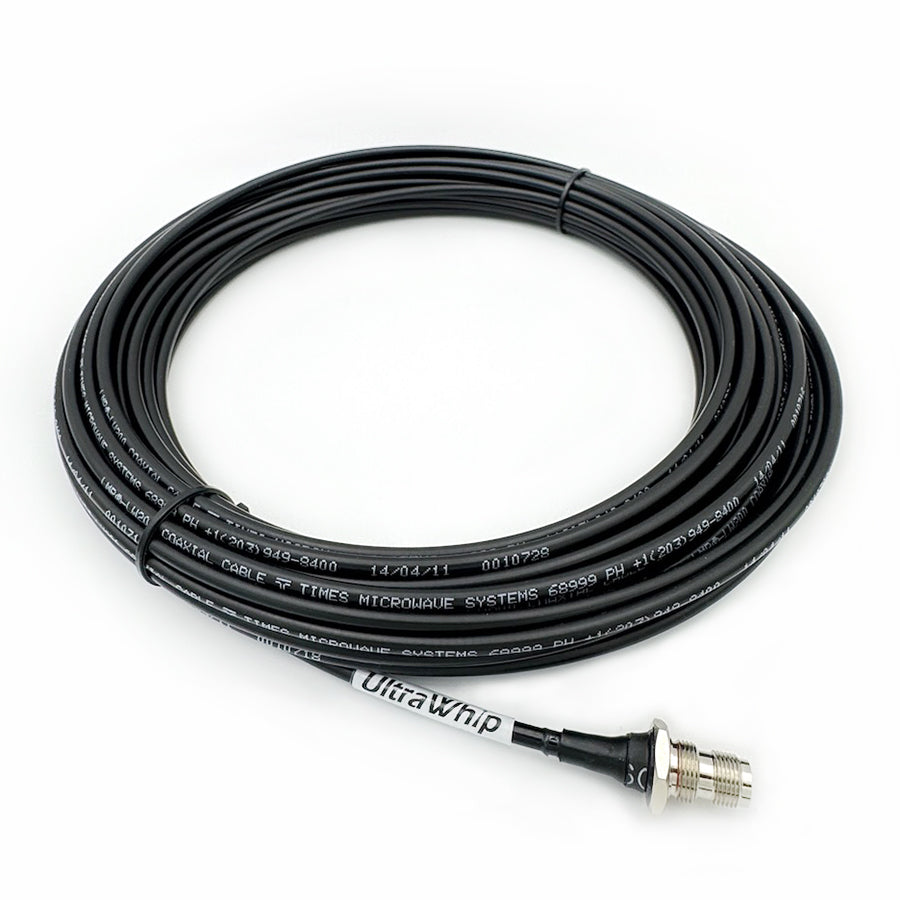 A black UltraWhip VHF antenna cable with a connector at one end, coiled and laid out on a white background.