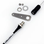 UltraWhip marine VHF antenna shown in exploded view with straight bracket, mounting hardware, and UltraWhip coax cable.