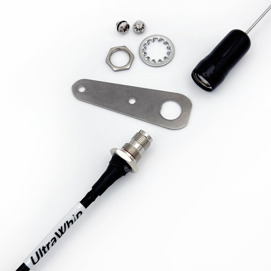 UltraWhip marine VHF antenna shown in exploded view with straight bracket, mounting hardware, and UltraWhip coax cable.